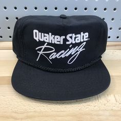 Vintage Quaker State Racing Black Zip Closure Hat Cap 80’s 90’s Era Adjustable. Vintage New Old Stock, Excellent Condition. Being a vintage hat, this hat may show signs of age/storage, see photos for best example of condition. Note, this hat has had it’s tag removed from the sweatband. Ships via USPS First Class Package with Tracking. *Please note, all hats are packaged in plastic clothing bags and have desiccant packs and a small piece of scented dryer sheet to ensure freshness while in storage Black Retro Trucker Hat, Retro Black Trucker Hat For Sports, Retro Curved Brim Hat For Sports Events, Retro 5-panel Hat For Streetwear, Vintage Trucker Hat With Curved Brim For Sports, Vintage Sports Snapback Hat With Curved Brim, Vintage Trucker Hat With Flat Brim For Streetwear, Vintage Black Baseball Cap For Sports Events, Vintage Snapback Hat With Curved Brim For Sports