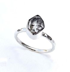 925 Sterling Silver Herkimer Diamond Ring, Natural Herkimer Diamond Silver Rings, Handmade Silver Rings, Raw Gemstone Ring.Product:- RingModal no:- U026Metal:- 925 Sterling SilverGemstone :- Herkimer DiamondGemstone size:- FancyFinishing:- Shiny SilverWe are using Pure 925 (Stamped) Sterling Silver with Natural Gemstone Jewelry, all of our jewelry designs are Handmade.We are adding new creative designs in our store regularly, for new handmade stuff please get touch with our store.We always try t Silver Birthstone Ring With Diamond Cut For Gift, Minimalist Silver Diamond Ring With Gemstone, Faceted Silver Sapphire Ring As Gift, Silver Faceted Sapphire Ring As Gift, Faceted Topaz Sterling Silver Ring For Promise, Silver Faceted Sapphire Ring For Gift, Modern Silver Rings With Ethical Gemstones, Sterling Silver Stackable Topaz Ring Gift, Silver Faceted Stackable Anniversary Rings