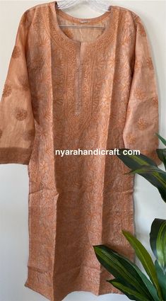 "Classy and classic !! Pure silk kurta with fine hand embroidery! Kurta length : 43 inches Fabric: Pure Tussar Silk Dry clean Only \"Slight stretch marks on the fabric due to embroidery frame are not considered as defects\"" Long Kurta With Floral Embroidery For Diwali, Diwali Long Kurta With Floral Embroidery, Chikankari Embroidered Tunic Kurta For Navratri, Navratri Chikankari Embroidery Tunic Kurta, Navratri Kurta With Chikankari Embroidery, Traditional Kurta With Resham Embroidery, Anarkali Chikankari Embroidery Kurta, Anarkali Kurta With Chikankari Embroidery, Festive Chikankari Embroidered Tunic