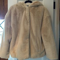 Nwt Tan Faux Fur Hoodie Size Medium Casual Hooded Fur Coat For Fall, Faux Fur Hooded Jacket For Fall, Fall Faux Fur Hooded Jacket With Long Sleeves, Beige Fluffy Outerwear For Cold Weather, Hooded Faux Fur Outerwear In Winter White, Cozy Hooded Jacket With Faux Fur Lining, Hooded Beige Fur Coat For Winter, Fluffy Beige Outerwear For Cold Weather, Cozy Long Sleeve Hooded Jacket With Faux Fur Lining