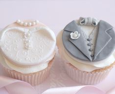 two cupcakes decorated to look like wedding suits and tie on top of each other