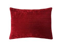 a red velvet pillow on a white background