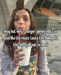 a woman drinking from a cup with the caption okay but why hungry games edits so good like the music taste the dial