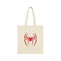 Introducing our Red Spider Tote Bag - A spooky and stylish bag, a bold and captivating accessory that effortlessly blends fashion-forward design with functionality. This striking tote bag is perfect for those who appreciate unique, eye-catching accessories that make a statement. Add a little bit of Halloween touch and creepiness to your outfit. Design: The Red Spider Tote Bag is a true masterpiece, that serves as the perfect canvas for a stunning spider web pattern. The spider, a symbol of creat Trendy Halloween Tote Bag, Everyday Halloween Tote Bag, Everyday Tote Bag For Halloween, White Rectangular Bag For Halloween, Trendy Red Canvas Gift Bag, Halloween Tote Bag For Daily Use, Halloween Tote Gift Bag, Halloween Gift Bag Tote, Rectangular Halloween Gift Bag