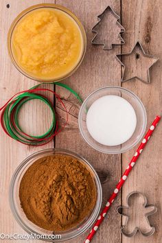 ingredients to make gingerbread cookies laid out on a wooden table