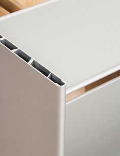 an image of a white table with drawers