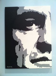 a black and white painting of a man's face