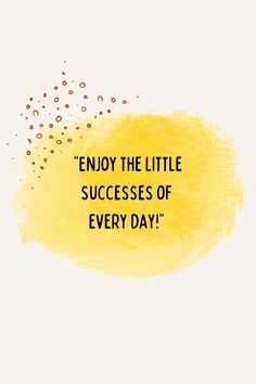 the words enjoy the little success of every day written on a yellow watercolor spot