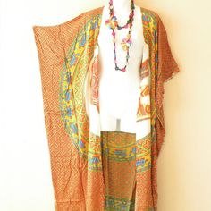 Price Is Fixed. I Do Not Accept Offer Price Due To Low Markup. Most Of My Clothing Are One Of The Kind So Please Check For Availability Before Buying. Please Bundle For Multiple Items To Save On Shipping Cost. Bundle Up In Style With This Cute Hand Painted Batik Cardigan / Duster Maxi Wrap. Design To Bring Comfort To Drape Beautifully To Wide Range Of Body Shapes And Sizes. With Luxuriously Premium Rayon Textured, This Open Front Cardigan Is A Must Have Layering Piece. Like Any Other Handmade Ba Red Bohemian Kimono For Fall, Red Bohemian Spring Cardigan, Red V-neck Summer Cardigan, Red Long Bohemian Outerwear, Long Red Bohemian Outerwear, Casual Red V-neck Kimono, Bohemian Orange Outerwear For Summer, Summer Bohemian Orange Outerwear, Red Summer Beach Cardigan