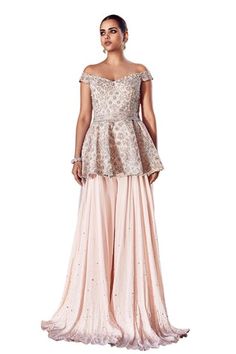 Blush pink peplum top with silver dori, pearl, mirror and sequin embroidery in floral pattern. Paired with sharara and belt. - Aza Fashions Pink Peplum Sets For Wedding, Elegant Pink Peplum Sharara, Elegant Pink Sharara With Lace Work, Elegant Pink Lace Work Sharara, Fitted Pink Sharara With Lace Work, Pink Fitted Lace Work Sharara, Pink Peplum Top, Sharara Set, Sequins Embroidery