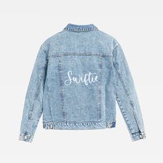 a blue jean jacket with the word'suitetie'written on it in white ink