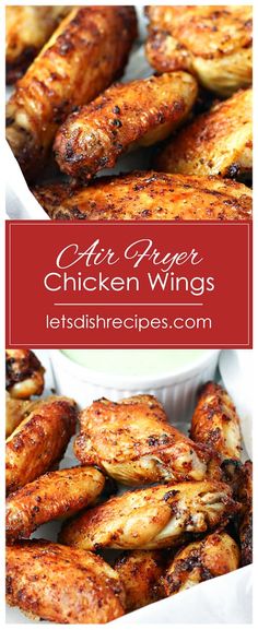 grilled chicken wings in a white dish with red text overlay that says air fryer chicken wings