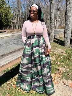 This Camo Maxi Skirt is all the rave!!! This maxi skirt has great details, a belt that is attached, pockets and a zipper that goes from the top of the skirt to the bottom just in case you want to unzip it and show some leg😉 This maxi skirt is so comfortable so you can dress it up or down and can be worn all year round. For a more relaxed look, you can pair this top with our Bodies Top and a pair of tennis or dress it up wearing a pair of heels and our bodied top with a nice clutch. For those ch Camo Skirt, Earthy Outfits, Deep Autumn, Autumn Wardrobe, Denim Shirts, Classy Design, Body Top, Skirt Maxi, Modest Clothing