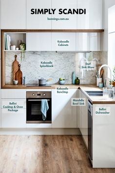 a kitchen with white cabinets and wood flooring has the words simply scandi on it