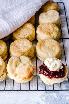 biscuits and jam are on a cooling rack