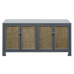 the sideboard with three doors is made from grey wood and has rattan panels