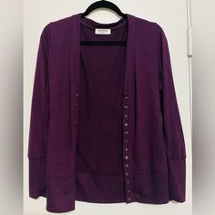 Nwot Zenana Snap Button Cardigan Size Small Color Eggplant Fabric 62% Polyester, 34% Rayon, 4% Spandex Casual Purple Cardigan With Buttons, Casual Purple Cardigan With Button Closure, Spring Purple Cardigan With Button Closure, Casual Purple Button-up Cardigan, Purple Long Sleeve Cardigan With Button Closure, Purple Button-up Cardigan With Buttons, Purple Button-up Cardigan, Long Sleeve Cardigan With Snap Buttons For Everyday Wear, Cotton Button-up Cardigan With Button Cuffs