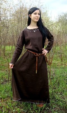 "This early medieval linen dress is universal for the Vikings and Slavs or any others reenactors. Based on medieval iconography and archaeological finds from Europe. Immerse yourself in the world of the Middle Ages with us. A minimalistic dress looks good in any situation, regardless of whether you capture the world with your beloved Viking or wear it in another era. Immerse yourself in the history of medieval fashion. This special dress is decorated with handmade embroidery, made of natural sil Reconstruction Fashion, Medieval Dress Peasant, Costume Viking, Viking Garb, Medieval Garb, Viking Dress, Womens Costumes, Viking Costume, Ren Fest