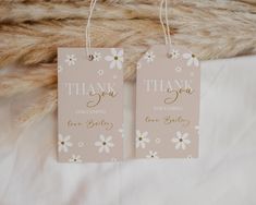 two tags that say thank you and have daisies on them with the words,