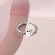 Your little girl will absolutely adore this delicately designed polished heart shaped ring. Beautifully crafted in genuine 925 sterling silver which is naturally hypoallergenic and suitable for girls with sensitive skin. Buffed to a brilliant luster, this sentimental choice for your little girl is destined to be cherished and is available in sizes 2-5. A gift box is included, ready for gift giving. Silver Heart Shaped Ring For Birthday, Cute Silver Heart Ring For Valentine's Day, Valentine's Day Hypoallergenic Heart Ring, Sterling Silver Heart Ring For Birthday And Valentine's Day, Adjustable White Gold Heart Cut Ring, Adjustable Sterling Silver Heart Ring, Dainty Personalized Silver Heart Ring, Valentine's Day Promise Ring In Sterling Silver, Personalized Silver Heart Cut Ring