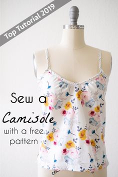 a white top with flowers on it and the words sew q camisoe