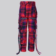 Discover Your Inner Highlander with the Clan Grant Modern Tartan Gothic Trousers: Experience the perfect blend of tradition, comfort, and edgy flair with the Clan Grant Modern Tartan Gothic Trouser X Strap Pant and Short from Skotsk. More than just clothing, this is a fashion statement for men and women who love to stand out. Make a Statement: Vibrant Clan Grant Tartan: Add a touch of Scottish heritage with a contemporary twist, letting your unique personality shine through. Versatile X-Strap Design: Switch between full-length trousers and trendy shorts effortlessly for different looks and occasions. For Everyone: Unisex Style: Breaking traditional fashion norms, these trousers are made to flatter both men and women, allowing everyone to express themselves. Ready for Anything: Sturdy 16oz