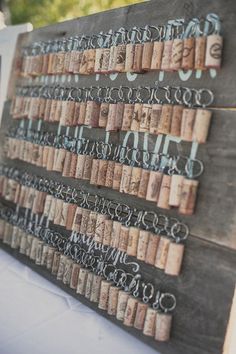 a wine cork wall hanging on the side of a table