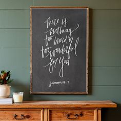 a chalkboard with a bible verse on it