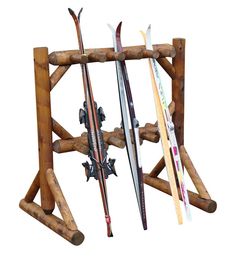 a wooden rack with skis hanging from it's sides