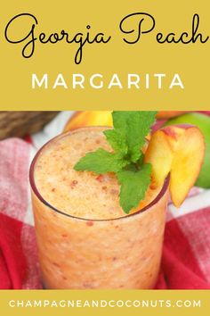 a peach margarita with mint garnish on top and the words, georgia peach margarita