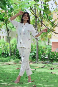 🍃 Product Features: Crafted from luxurious, imported Linen for an elegant feel Stunning two-piece co-ord set with an abstract Indian Work for a chic look Versatile for casual outings, events, or special occasions 🧵 Specifications: -- Top: Abstract shirt -- Bottom: Coordinated matching pants -- Sizes: Available in S, M, L, XL, XXL ✨ Care Instructions: -- Hand wash or gentle machine wash -- Use mild detergent only -- Do not bleach; iron on low heat 📏 Size Guide: -- Refer to our detailed size ch White Summer Sets With Set-in Sleeves, Festive Short Sleeve Sets For Summer, Summer Cotton Sets With Set-in Sleeves, White Short Sleeve Pant Set For Summer, Abstract Shirt, Matching Outfit, Matching Pants, Co Ord Set, Co Ord