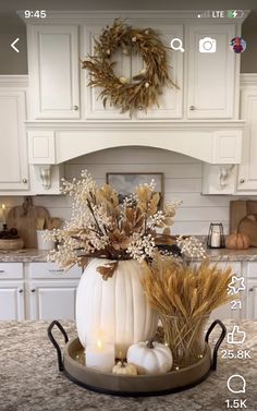 a white pumpkin sitting on top of a kitchen counter