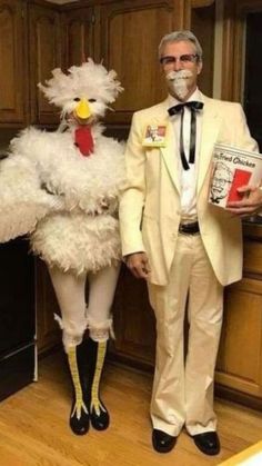 two people dressed in costumes standing next to each other with chicken legs on their feet