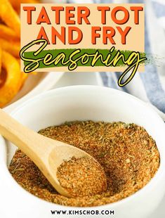 a wooden spoon in a white bowl filled with seasoning next to some french fries