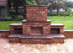 a brick oven sitting on top of a patio