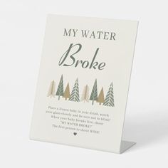 a card that says, my water broke with trees in the background and a poem written on it