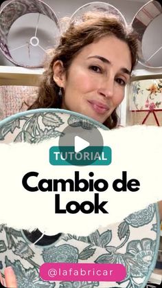 a woman holding up a plate with the words cambio de look in front of her