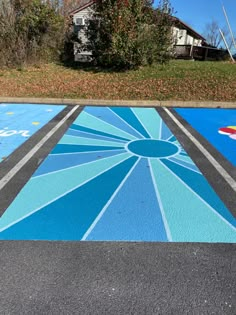 a painted parking lot with a skateboard on it