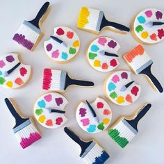 decorated cookies with colorful brush and hearts on them