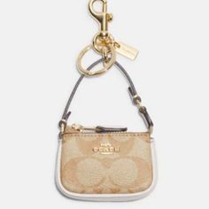 Questions? Leave A Comment Below! Beige Pouch Bag With Gold-tone Hardware, Gold Coach Bag With Removable Pouch, Coach Gold Bags For On-the-go, Gold Coach Bags For Everyday, Cute Signature, Coach Mini Bag, Signature Canvas, Coach Accessories, Key Card Holder