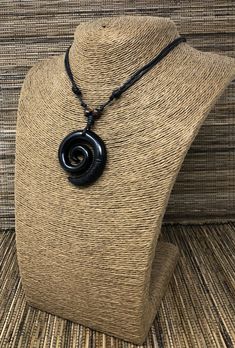 "*Beautiful Spiral Necklace *The Spiral signifies a New Beginning, Spirituality, Peace and Tranquility *Adjustable Black Cord - Fits Most Size - From 16\" Inches up to to 30\" Inches. Pull the knots and the cord to adjust the lenght *Pendant Dimensions: Approximately 2\" Inches x 2\" inches This beautiful necklace is simply stunning. Our commitment to excellent quality ensures each piece is skillfully inspected. Order this today or browse our incredible selection of jewelry. FAST SHIPPING! *Firs Adjustable Symbolic Spiral Jewelry, Symbolic Adjustable Spiral Jewelry, Spiral Adjustable Necklace As Gift, Adjustable Spiral Necklace For Gifts, Adjustable Spiral Necklace As Gift, Adjustable Spiral Necklace For Gift, Handmade Adjustable Spiral Necklace, Handmade Adjustable Swirl Jewelry, Black Adjustable Spiral Necklace