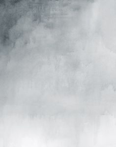 a black and white photo of a person on a surfboard in the water with fog