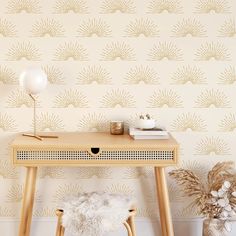 a wooden table with a white chair next to it and a wallpapered background