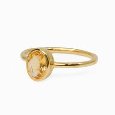 This golden variety of quartz is the perfect gem to wear day or night and transform any style. Known as the stone for wealth and abundance. Carrying the power of the sun, this warm and comforting, energizing, and life-giving stone will not only brighten any outfit but also brighten your life in more ways than one. This Citrine ring does not hold and accumulate negative energy therefore this stone never needs cleansing. Stone Origin: Brazil Current Size: 6.5 Measures Approximately: 8 x 6 mm Mater Timeless Yellow Gold Crystal Gemstone Ring, Timeless Yellow Gold Crystal Ring With Gemstone, Timeless Gold Birthstone Ring With Gemstone, Gold Rings With Natural Stones And Citrine, Gold Round Gemstones With Large Stone, Everyday Citrine Gemstone Jewelry, Spiritual Yellow Gold Crystal Ring With Gemstone, Gold Topaz Gemstone Adjustable Ring, Gold Crystal Ring With Large Stone For Promise