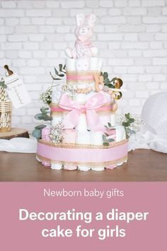 How To Make A Diaper Cake Step By Step, Baby Girl Diaper Cake Ideas, Baby In Bloom Diaper Cake, How To Make A Diaper Cake, Girl Diaper Cake Ideas, Nappy Cake Ideas, Diaper Cake For Girl, Diy Diaper Cake Tutorial, Small Diaper Cakes