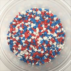 a cake with red, white and blue sprinkles