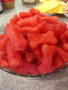 watermelon pieces in a glass bowl on a table