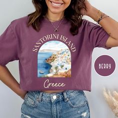 Santorini Island Greece Comfort Colors® T-Shirt, Greece Vacation Tee Shirt Gift, Thera Tee Shirt, Greek Islands Travel TShirt, Santorini Tee. Orders are processed within 24 hours and shipped out within 2 to 5 business days. What you receive: Comfort Colors® Adult Unisex Crewneck T-shirt Color Choices: Ivory Pepper Blue Jean Blue Spruce Moss Berry Crimson Yam Orchid Sizes: Unisex adult sizing use size chart as a guide. These shirts are fitted and run true to size. If you prefer a loose fit go one size larger. If you want an oversized tee consider even 2 sizes larger. Shirt Details: Comfort Colors introduces its garment-dyed t-shirt; a fully customizable tee made 100% with ring-spun cotton. The soft-washed, garment-dyed fabric brings extra coziness to your wardrobe while the relaxed fit make Purple Printed Short Sleeve Tops, Purple Tops With Custom Print For Summer, Purple Graphic Tee With Custom Print, Santorini Island Greece, Travel Tshirt, Santorini Island, Greece Vacation, Blue Spruce, Island Travel