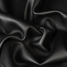 black leather textured up close to the surface