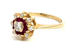 Item Specifications:Metal: 14K Yellow GoldStyle: Statement RingRing Size: 7.5 (resizing available for a fee)Total Weight: 3.5 GramsGemstone Specifications:Gemstones: 8 red rubiesRuby Carat Weight: 0.16 caratsDiamond Carat Weight: 0.26 carats (center: 0.16 all others 0.10)Diamond Count: 9Diamond Color: G-HDiamond Clarity: VS-SI1Condition: PreownedStamped: "14K" Yellow Gold Ruby Flower Ring For Anniversary, Red 14k Stamped Cluster Ring, Red Cluster Ring Stamped 14k, Red Flower Shaped Ruby Ring For Formal Occasions, Red Flower Ruby Ring For Formal Occasions, Red Flower Ruby Ring For Formal Events, Formal Red Flower Ruby Ring, Red 14k Gold Flower Ring For Anniversary, Flower Ring